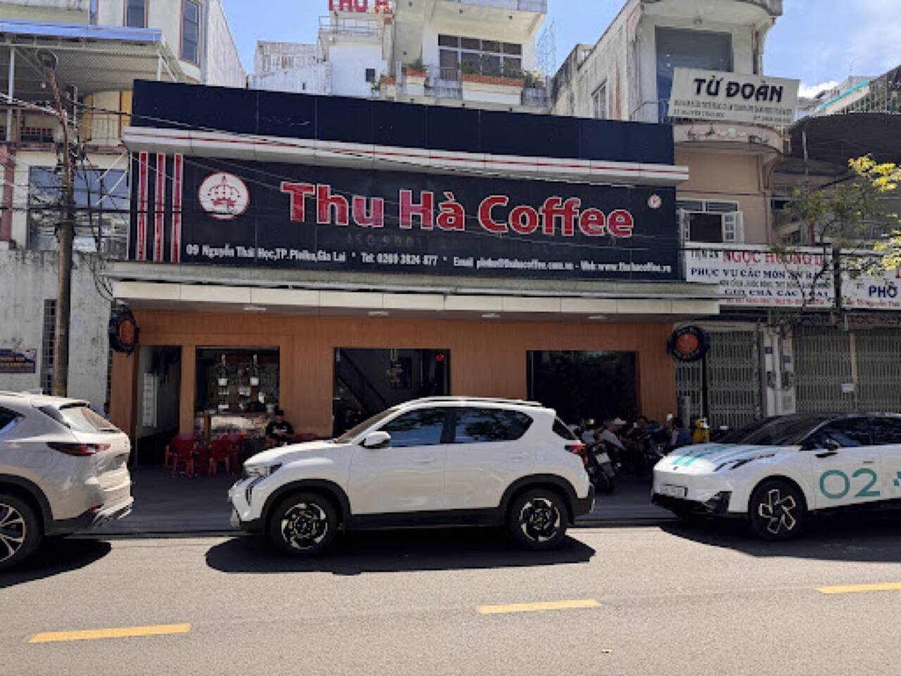 Mặt tiền Cafe Thu Hà trên đường Nguyễn Thái Học với biển Thu Hà Coffee